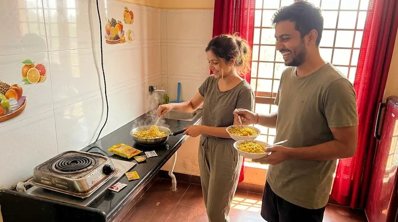 Couple cooking hot Maggi and making tea in Cottage Type A mini-kitchen at Bimal Farm